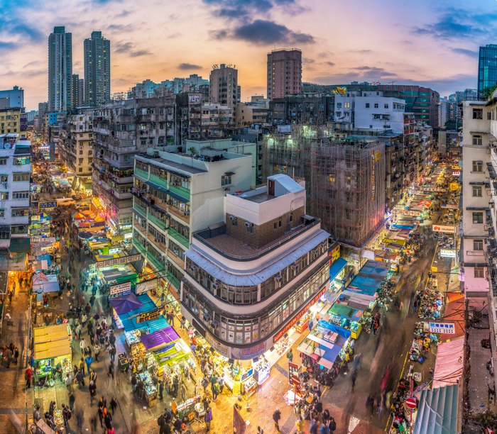 Hong Kong street market at dusk with long exposure