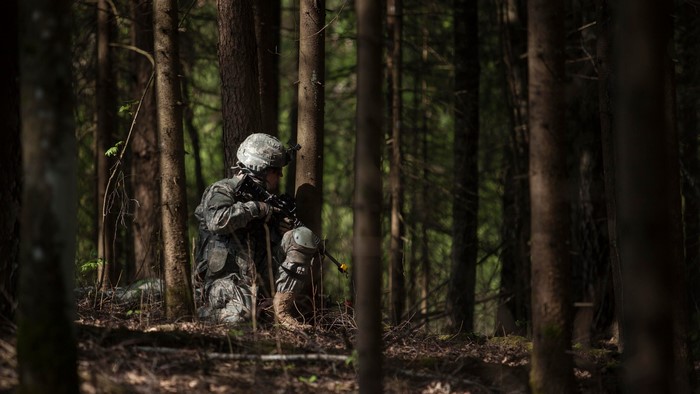 United States Army Soldier with Blank Firing Adapter in Forest