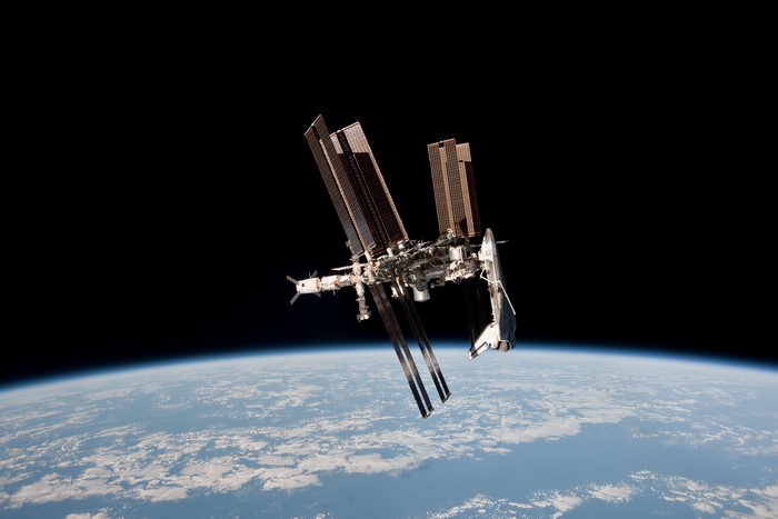 International Space Station and Space Shuttle above Earth