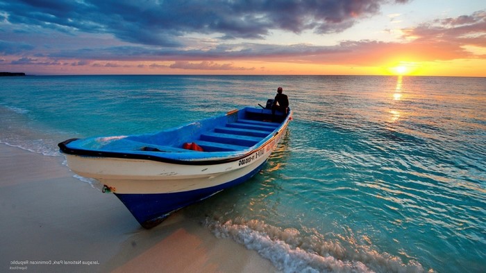 Boat on a beach at sunset