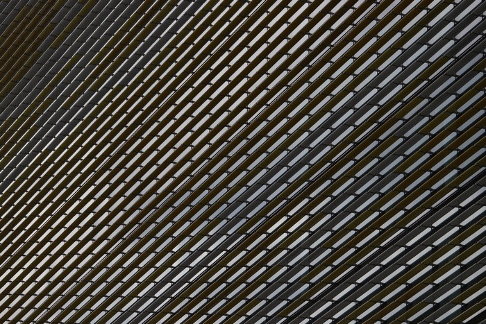 Abstract architectural pattern of diagonal louvers