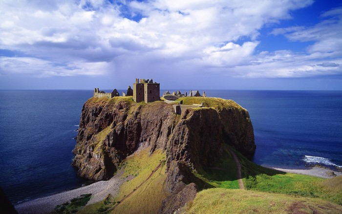 Ancient Castle Ruins on Scottish Coastal Cliff
