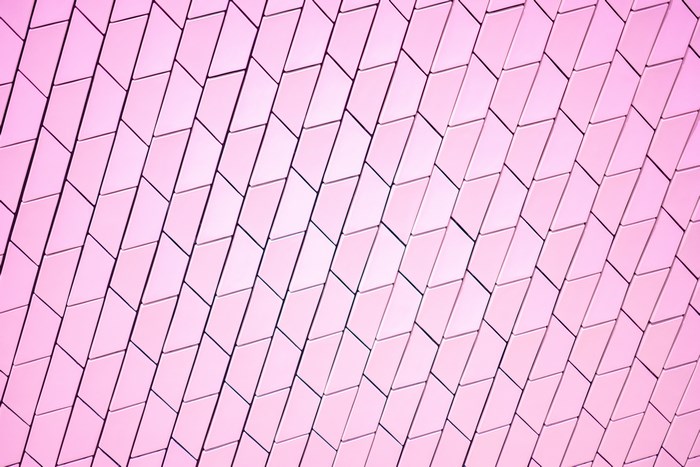 Pink tiled building exterior pattern
