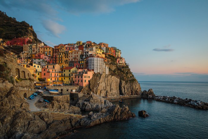 Colorful buildings on a cliff overlooking the sea in Cinque Terre, Italy