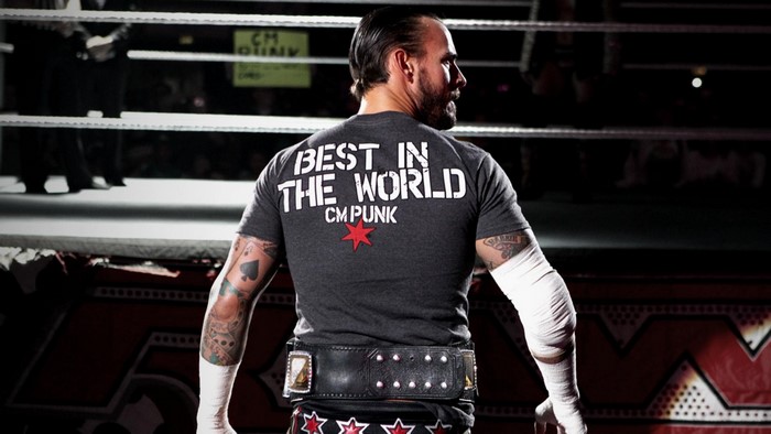CM Punk from WWE wearing a championship belt