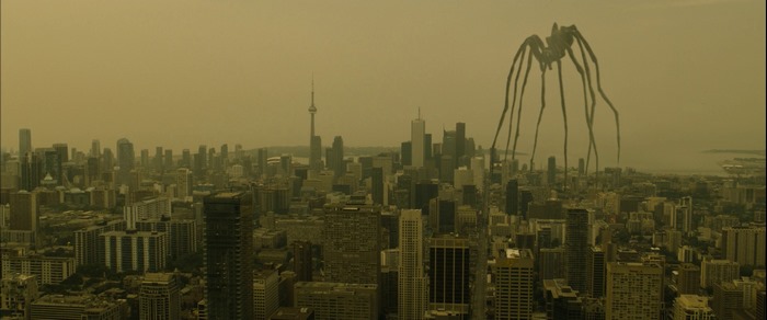 Giant spider-like creature over Toronto skyline