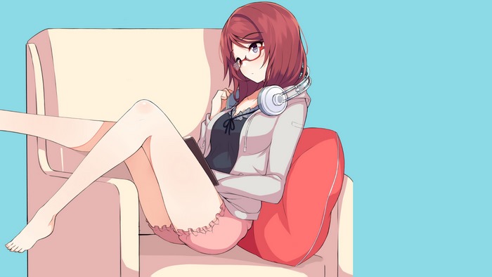 Maki Nishikino from Love Live sitting on a couch