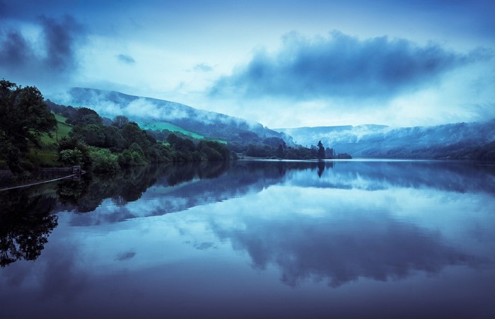 Misty Mountains Reflecting in a Lake