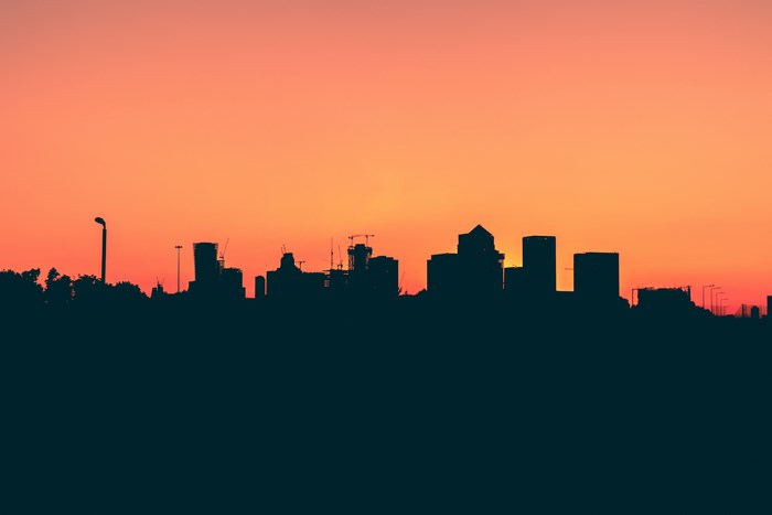 City skyline silhouette at sunset