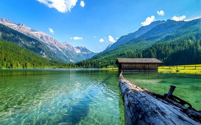 Tranquil Mountain Lake with Boathouses in Austria
