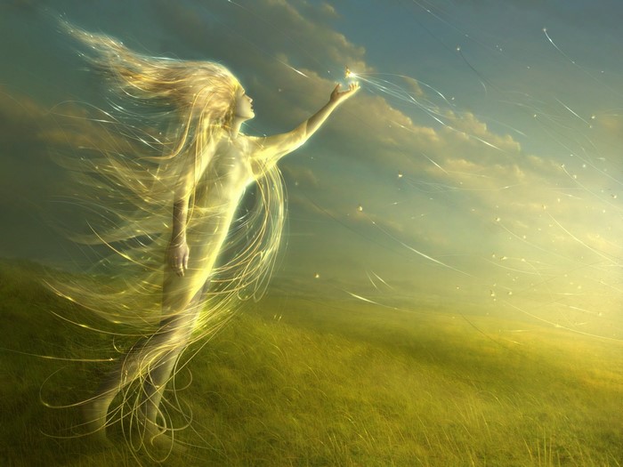 Fantasy art of a glowing woman in a field