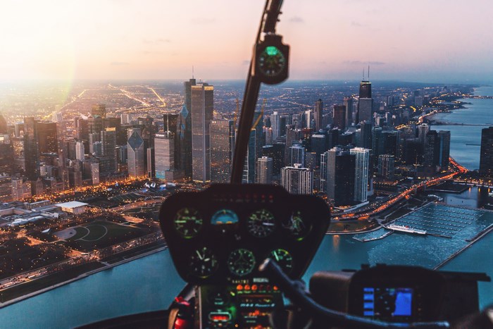 Helicopter view of Chicago cityscape at sunset