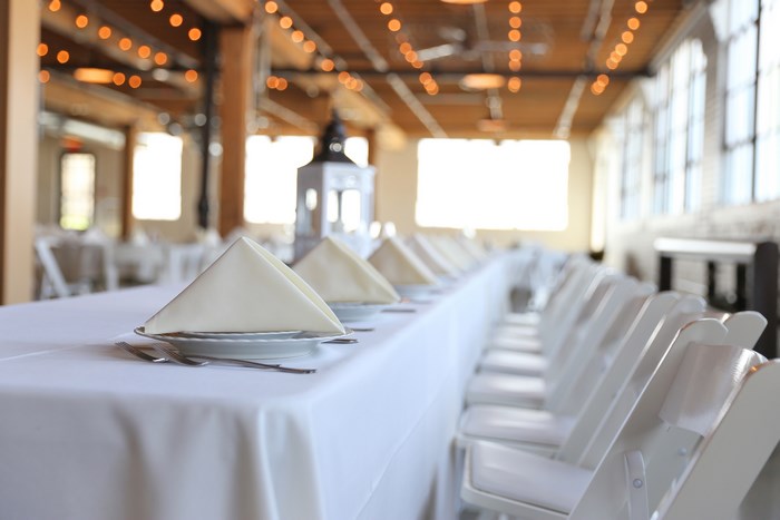 Wedding reception venue with tables and chairs