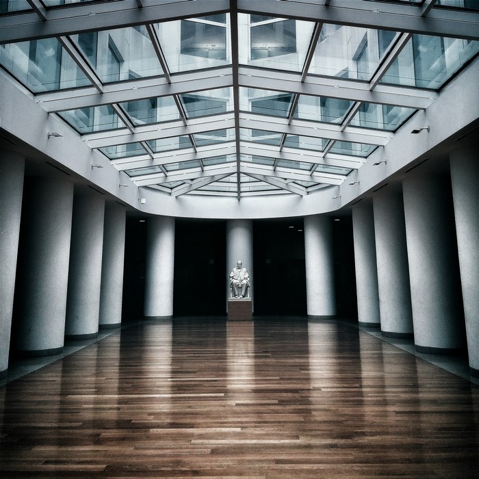 Interior hall with statue and glass ceiling