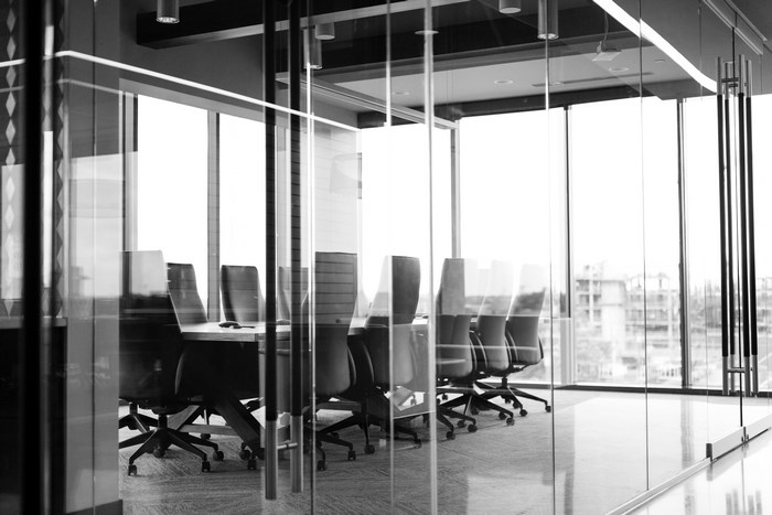 Empty modern conference room with glass walls