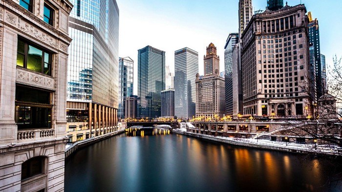 Chicago River and skyscrapers at dusk