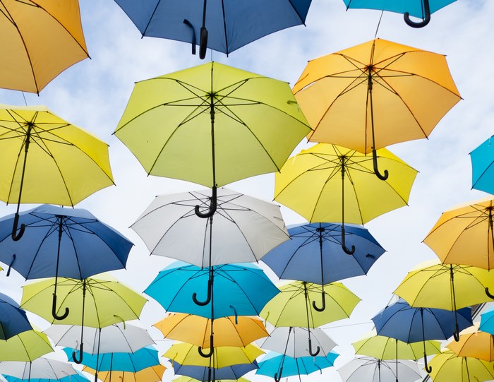Colorful umbrellas suspended in the sky