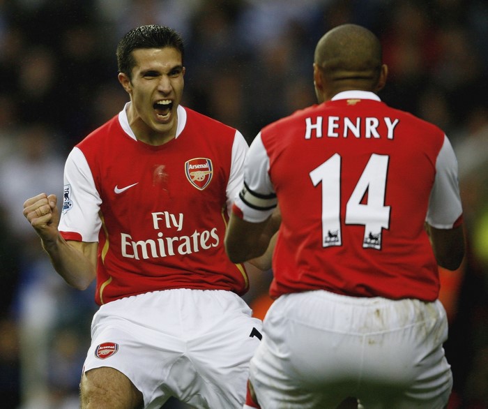 Robin van Persie and Thierry Henry of Arsenal