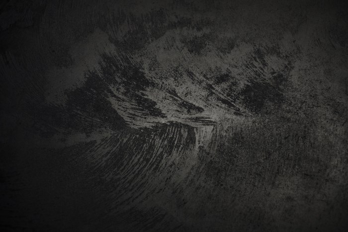 Dark Textured Concrete Surface with Gritty Details