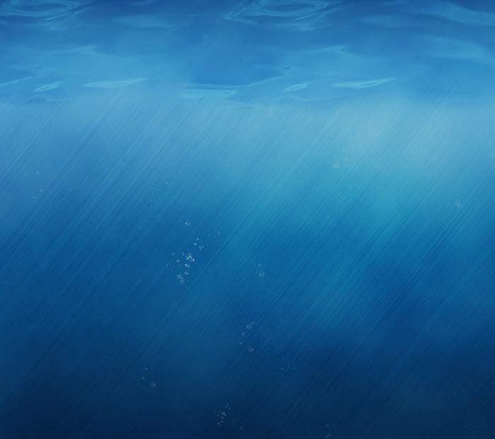 Underwater scene with sun rays and bubbles