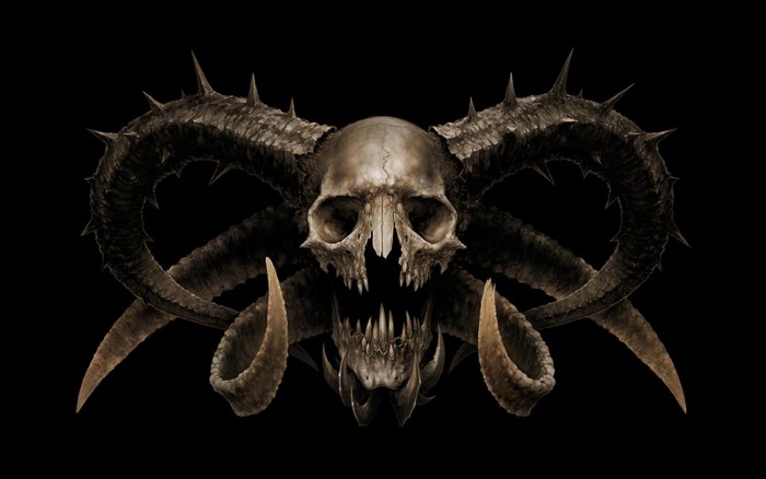 Demonic creature skull with sharp horns and fangs