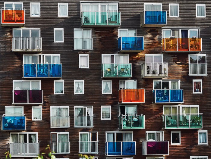 Building with colorful balconies and windows