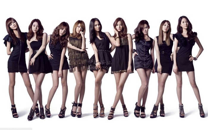 Girls' Generation group of Asian women in black dresses