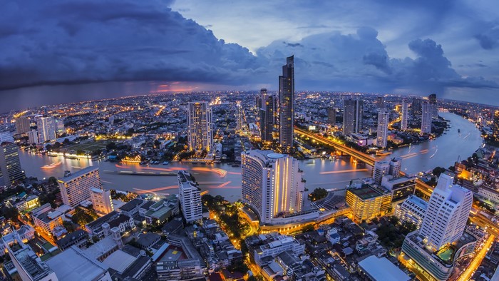 Bangkok cityscape with Chao Phraya River at dusk