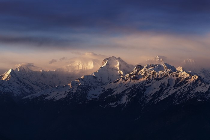 Sunlit Himalayan Snowy Mountain Range at Dawn