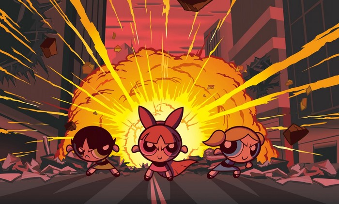The Powerpuff Girls in front of an explosion