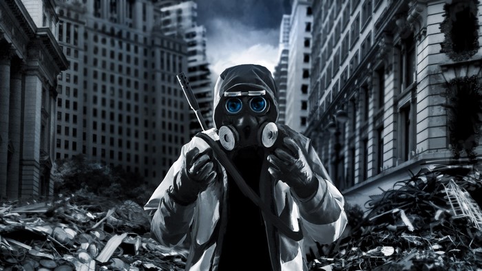 Gas mask wearer in a destroyed city
