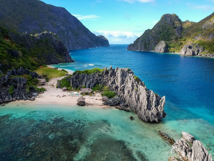 Tropical Island Paradise with Turquoise Waters and Cliffs