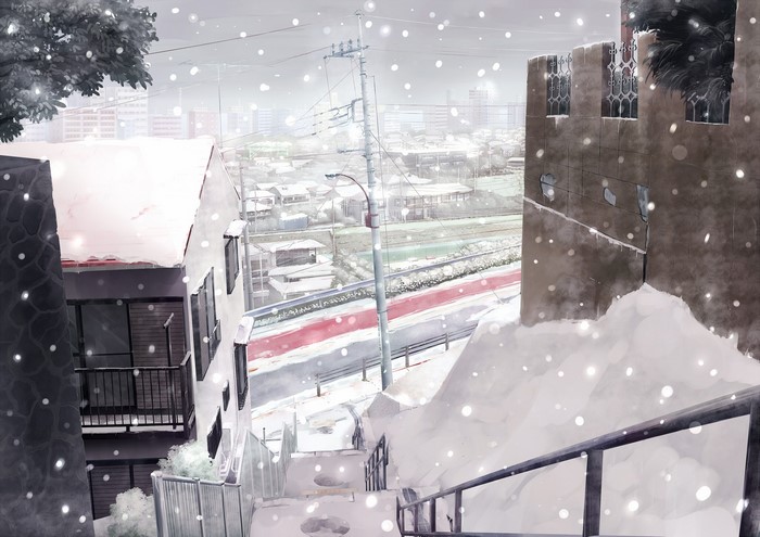 Cityscape in winter with snow falling