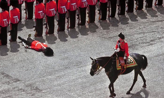 Soldier collapses during a parade in England
