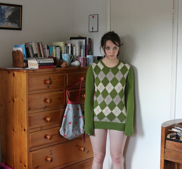 Imogen Dyer wearing a green argyle sweater