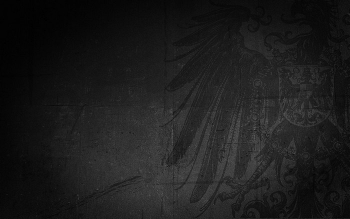 Black eagle crest with ornate details
