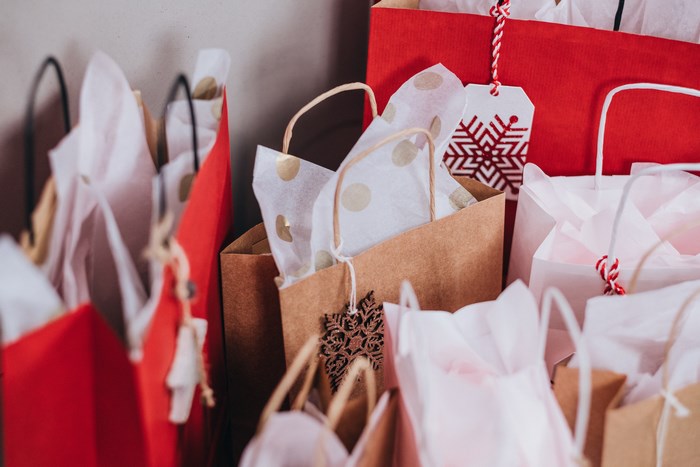 Christmas gift bags with snowflake and polka dot tissue paper