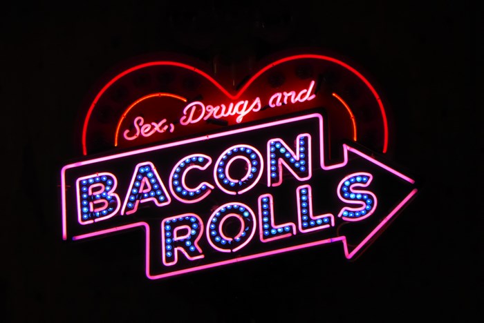 Neon sign for Sex, Drugs and Bacon Rolls