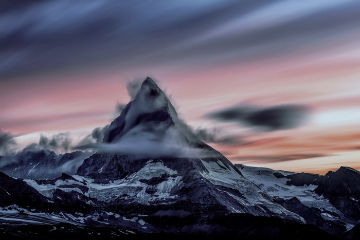 Matterhorn mountain at sunset with clouds