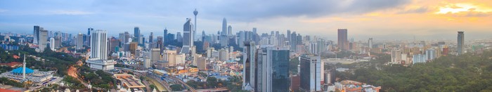 Kuala Lumpur skyline with Petronas Towers at sunrise