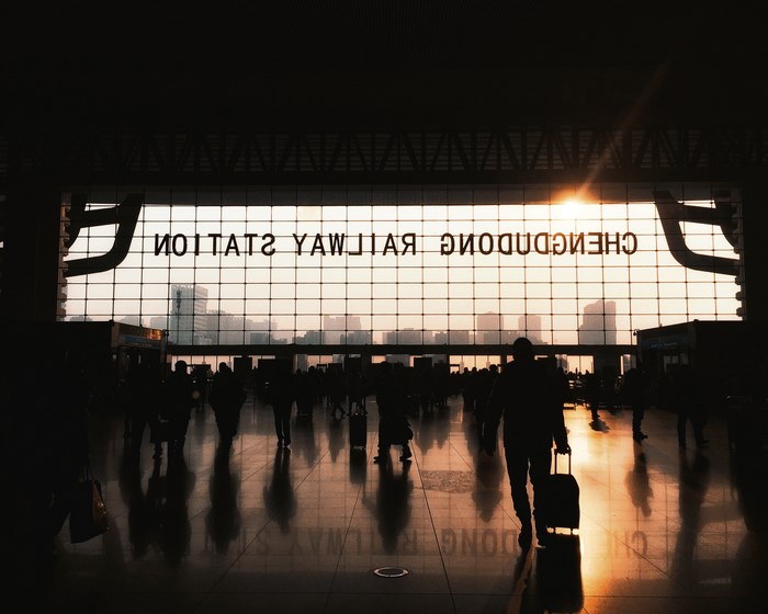 Chengdu Railway Station at sunset with silhouettes