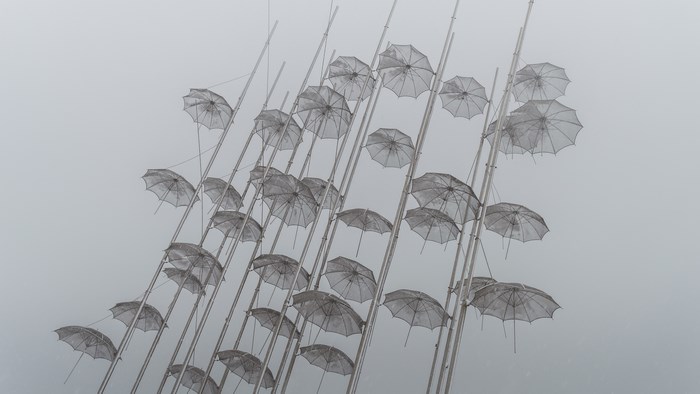 Transparent Umbrellas Installation on Poles
