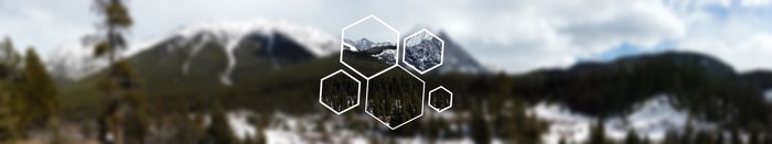 Blurred mountain landscape with hexagonal overlays