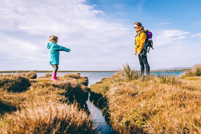 Mother and daughter by a lake in Australia
