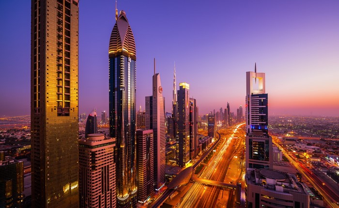 Dubai City Skyline at Sunset with City Lights