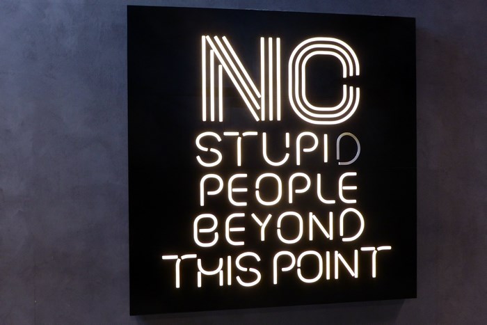 Neon Sign No Stupid People Beyond This Point