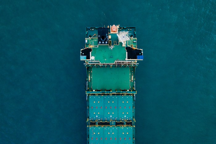 Aerial view of a cargo ship on the ocean