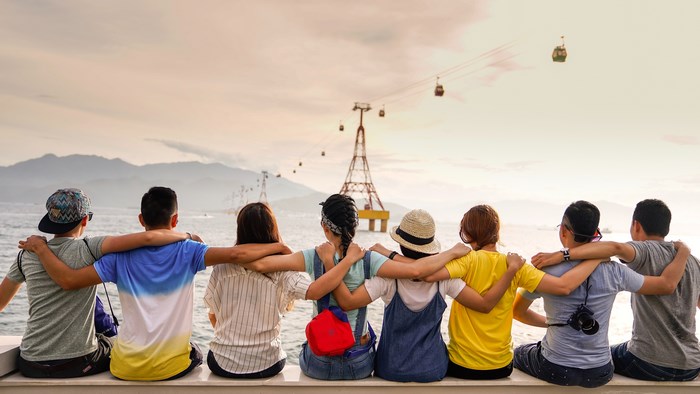 Group of friends hugging at Vinpearl Nha Trang