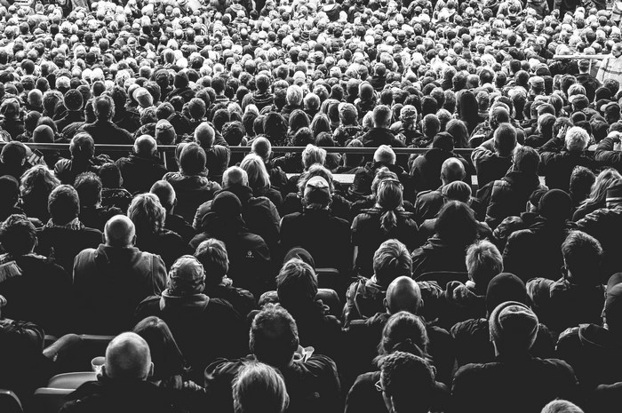 Black and white image of a large crowd of people