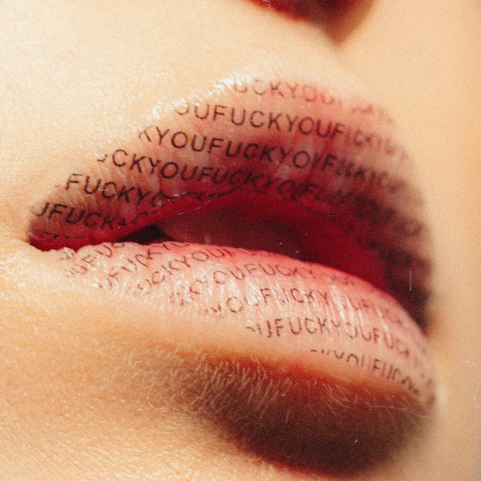 Close-up of lips with text overlay